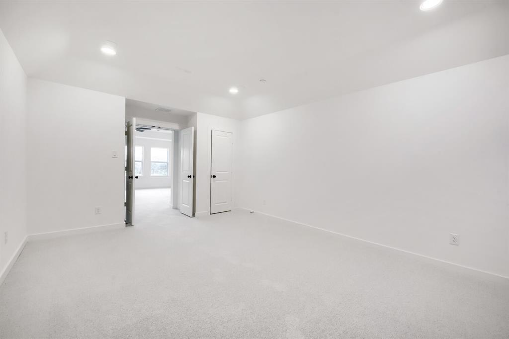 733 Red Cedar Road Haslet, TX 76052 - Photo 17 of 28 Spacious room featuring light-colored carpeting and recessed ceiling lighting