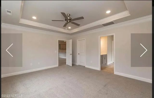 a bathroom with double vanity sinks and a mirror