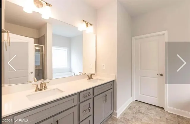 a view of a room with white walls