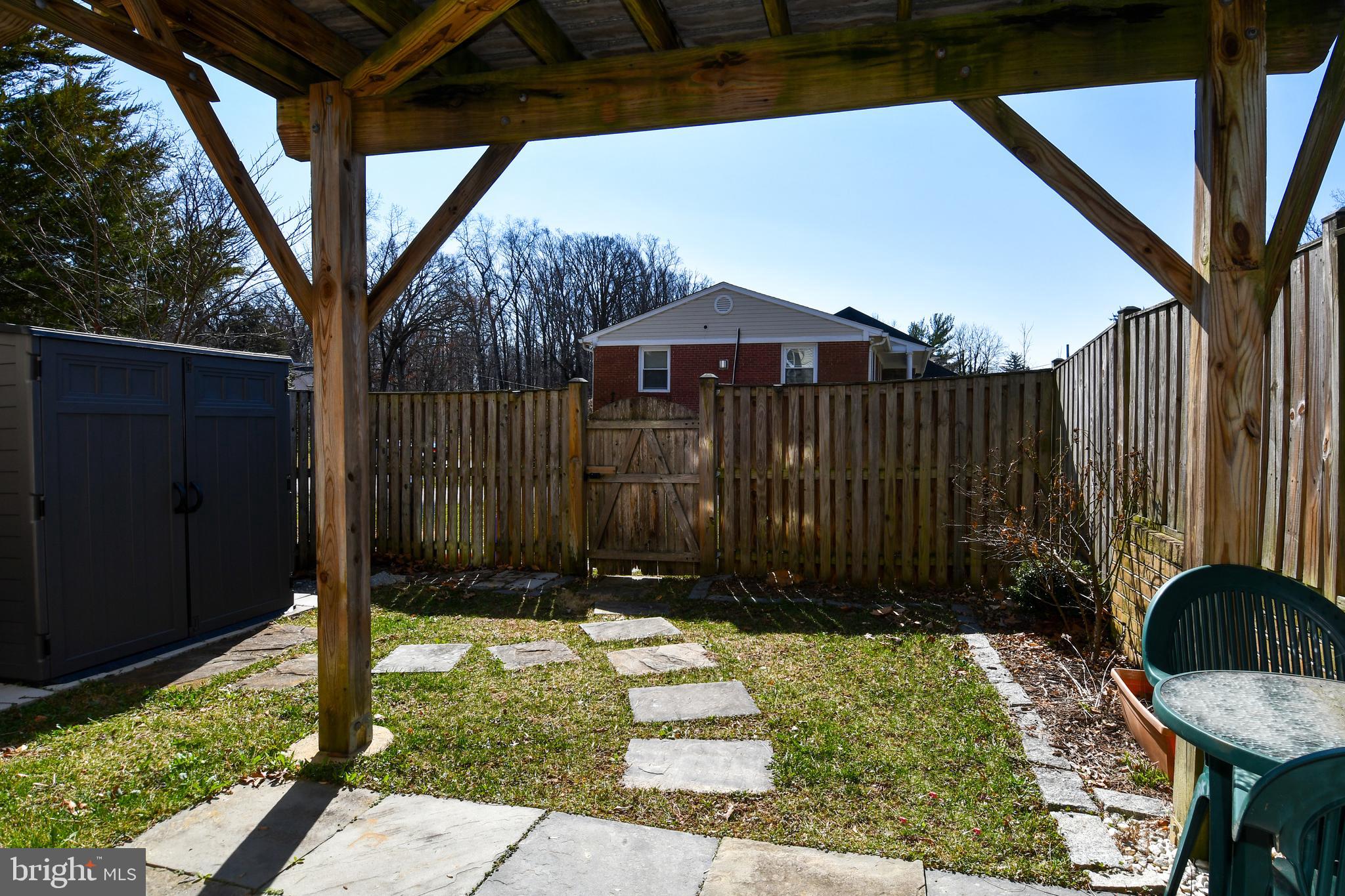 1048 Windrush Lane, Unit 39 Sandy Spring, MD 20860 - Photo 37 of 39 a garden view with a seating space
