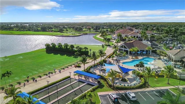 an aerial view of a house with garden space and outdoor seating