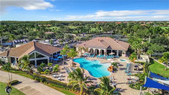 an aerial view of a house with a garden