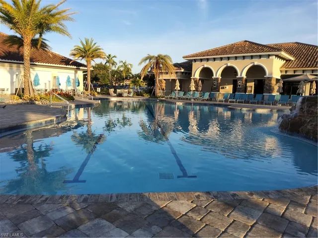 a view of a golf course with a lake