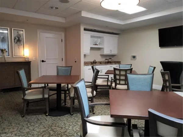 a view of a dining room with furniture