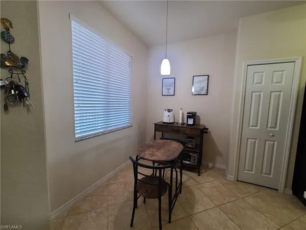 a kitchen with stainless steel appliances granite countertop a refrigerator sink and cabinets