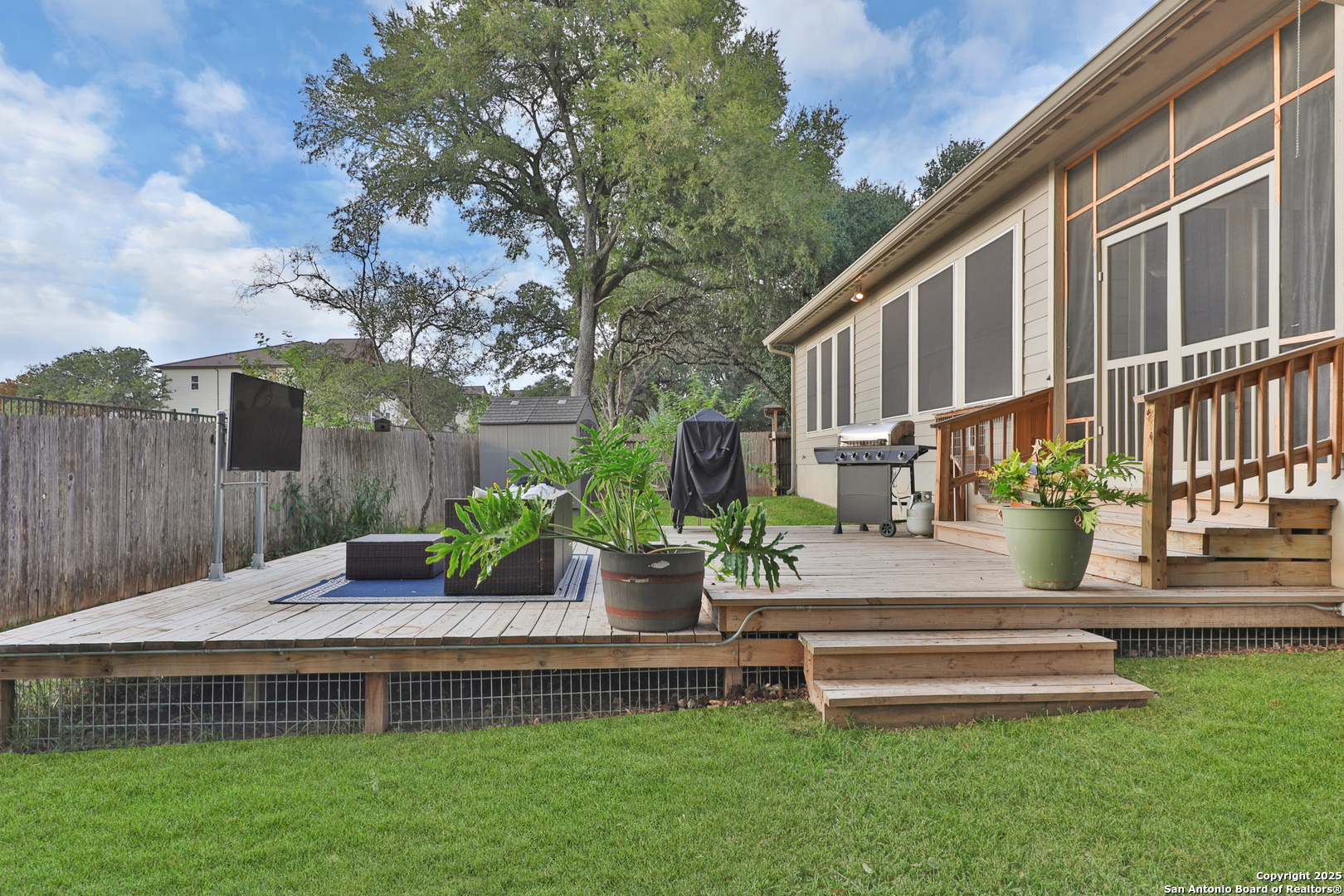 10811 Newcroft Place Helotes, TX 78023 - Photo 41 of 52 a view of a house with a yard porch and sitting area