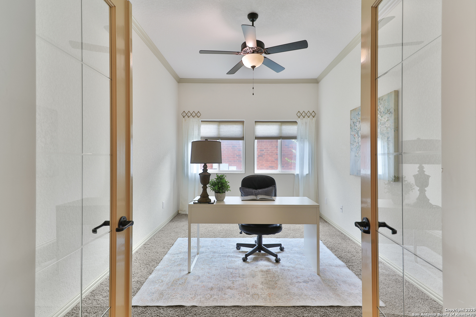 10811 Newcroft Place Helotes, TX 78023 - Photo 10 of 52 a living room with furniture a window and a potted plant
