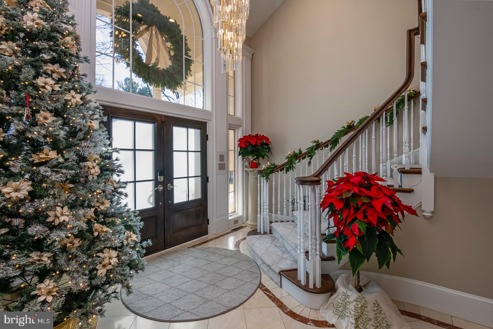 1504 Old Mill Road Reading, PA 19610 - Photo 7 of 77 Open entranceway with curve stairway