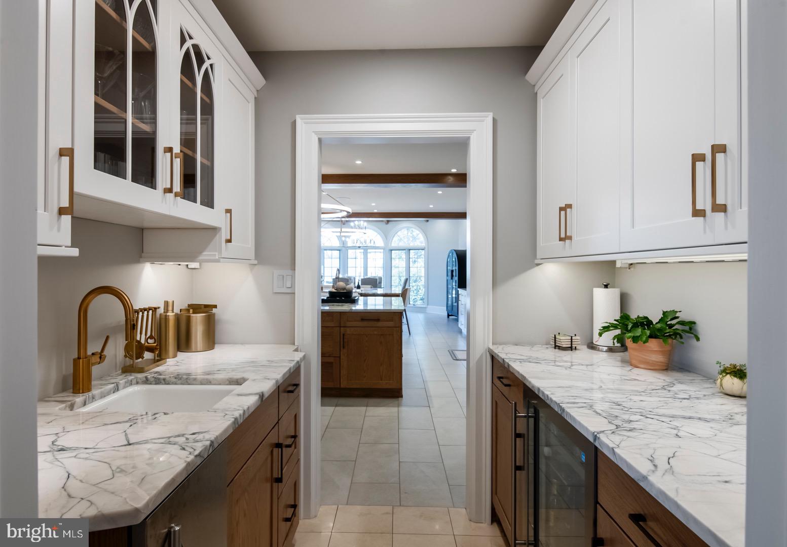 1504 Old Mill Road Reading, PA 19610 - Photo 10 of 77 Butlers Pantry with sink, refrigerator & ice maker