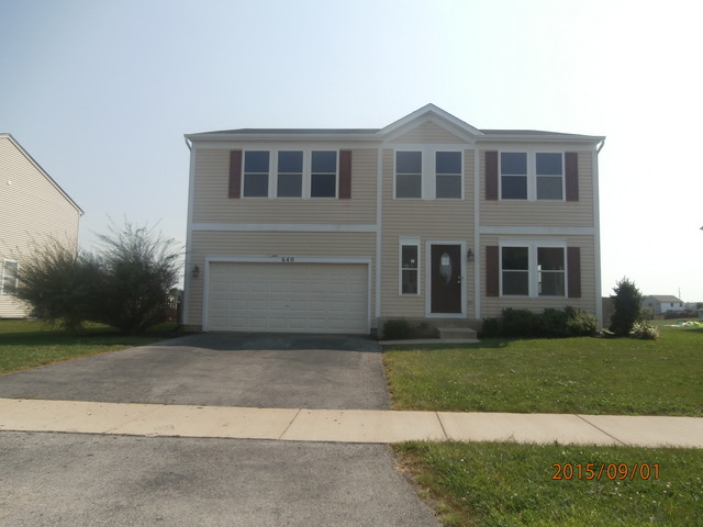 640 Halfway Road Bourbonnais, IL 60914 - Photo 1 of 15 a front view of a house with a yard