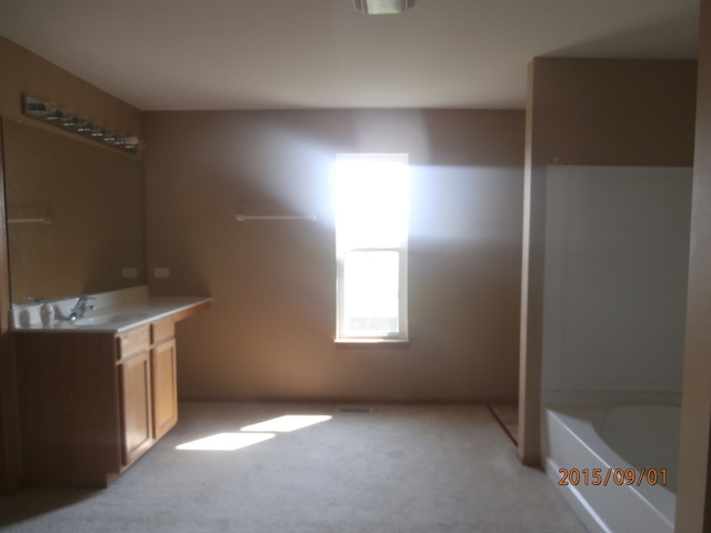 640 Halfway Road Bourbonnais, IL 60914 - Photo 11 of 15 an empty room with windows