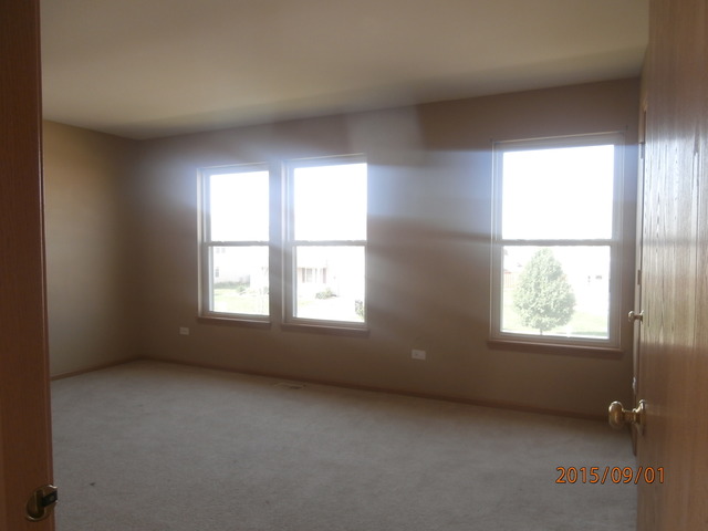 640 Halfway Road Bourbonnais, IL 60914 - Photo 7 of 15 an empty room with a window