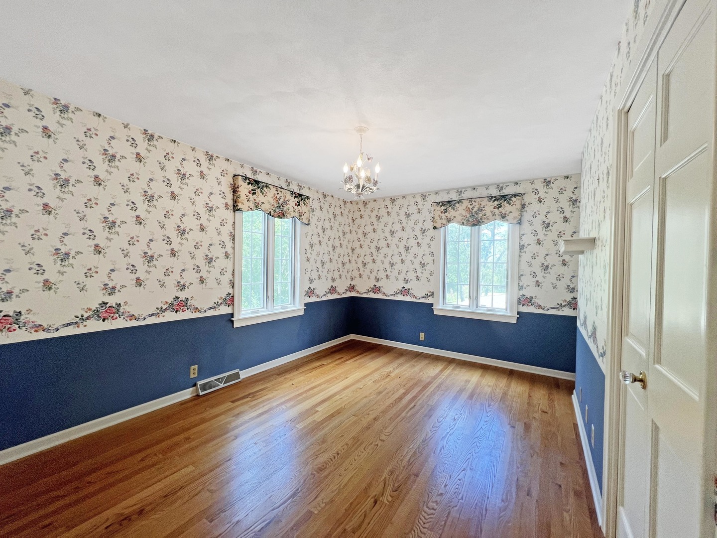 1017 Fisk Road Compton, IL 61318 - Photo 33 of 60 a view of an empty room with wooden floor and a window