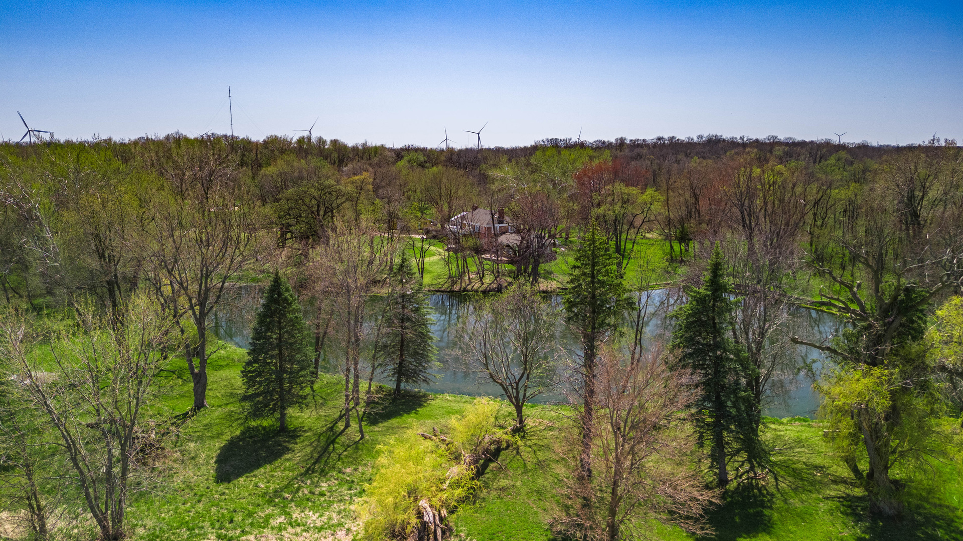 1017 Fisk Road Compton, IL 61318 - Photo 48 of 60 a view of a lake and green valley