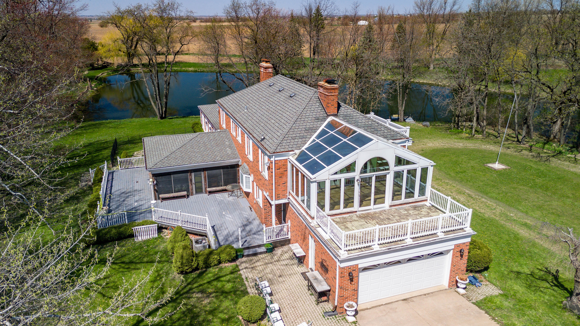 1017 Fisk Road Compton, IL 61318 - Photo 10 of 60 an aerial view of a house with a garden