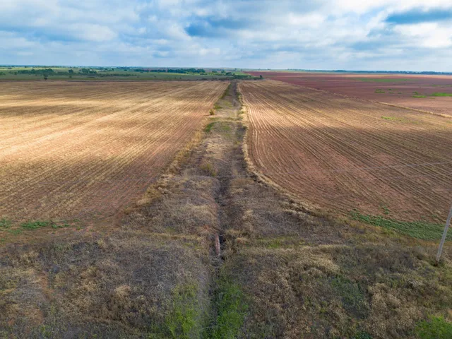 a view of an ocean and a yard