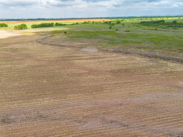 a view of an ocean and a yard