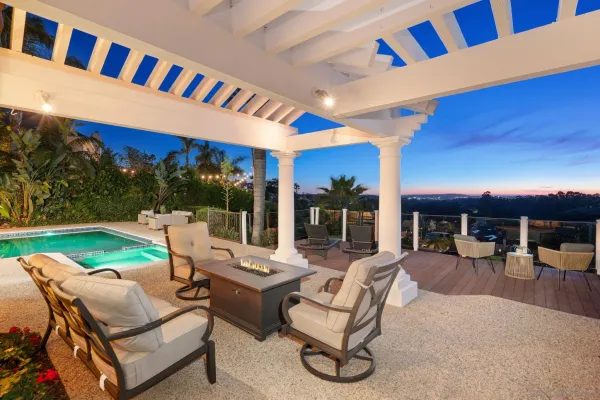 a outdoor living space with furniture and garden view
