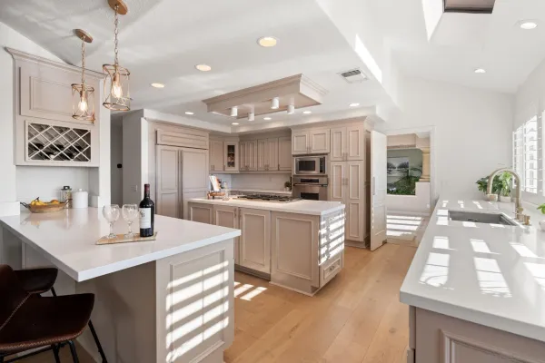 a kitchen with a sink stove and refrigerator