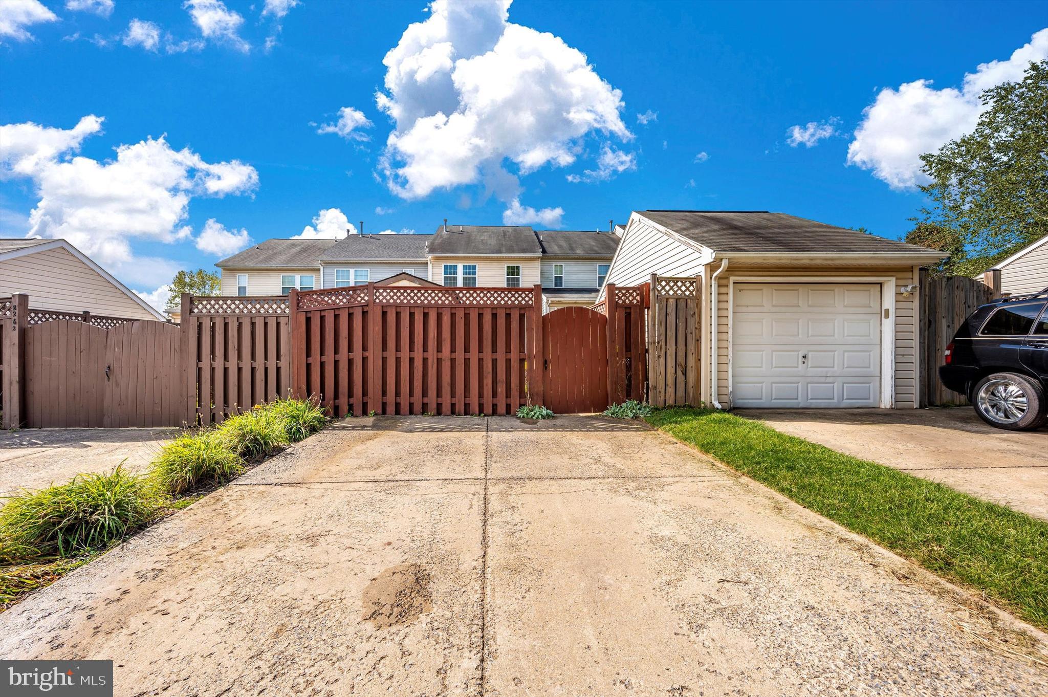 2264 Wetherburne Way Frederick, MD 21702 - Photo 35 of 49 Rear home parking