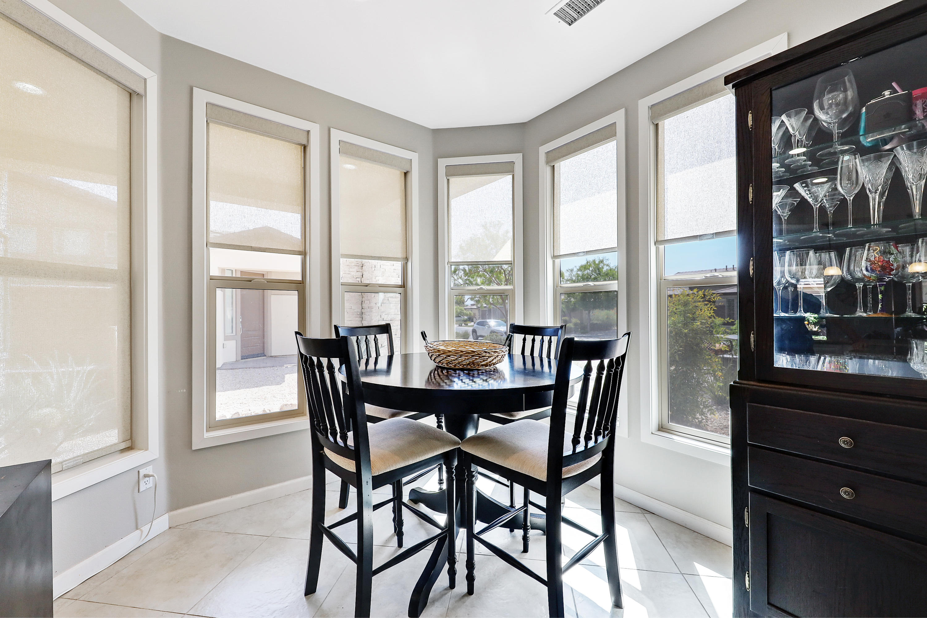 82782 Kingsboro Lane Indio, CA 92201 - Photo 13 of 39 a view of a dining room with furniture large windows and outside view
