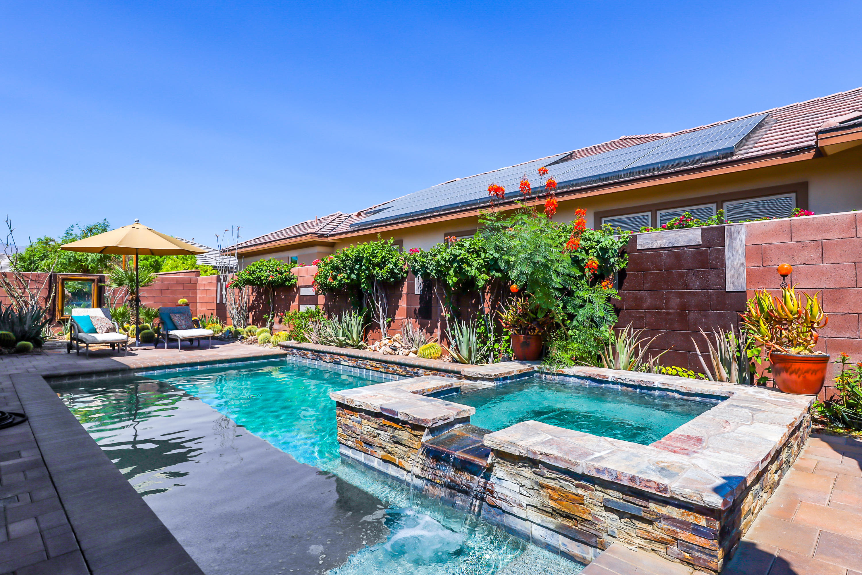 82782 Kingsboro Lane Indio, CA 92201 - Photo 25 of 39 swimming pool with outdoor seating and yard