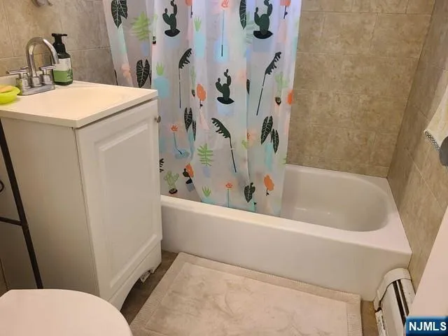 a bathroom with a sink and toilet