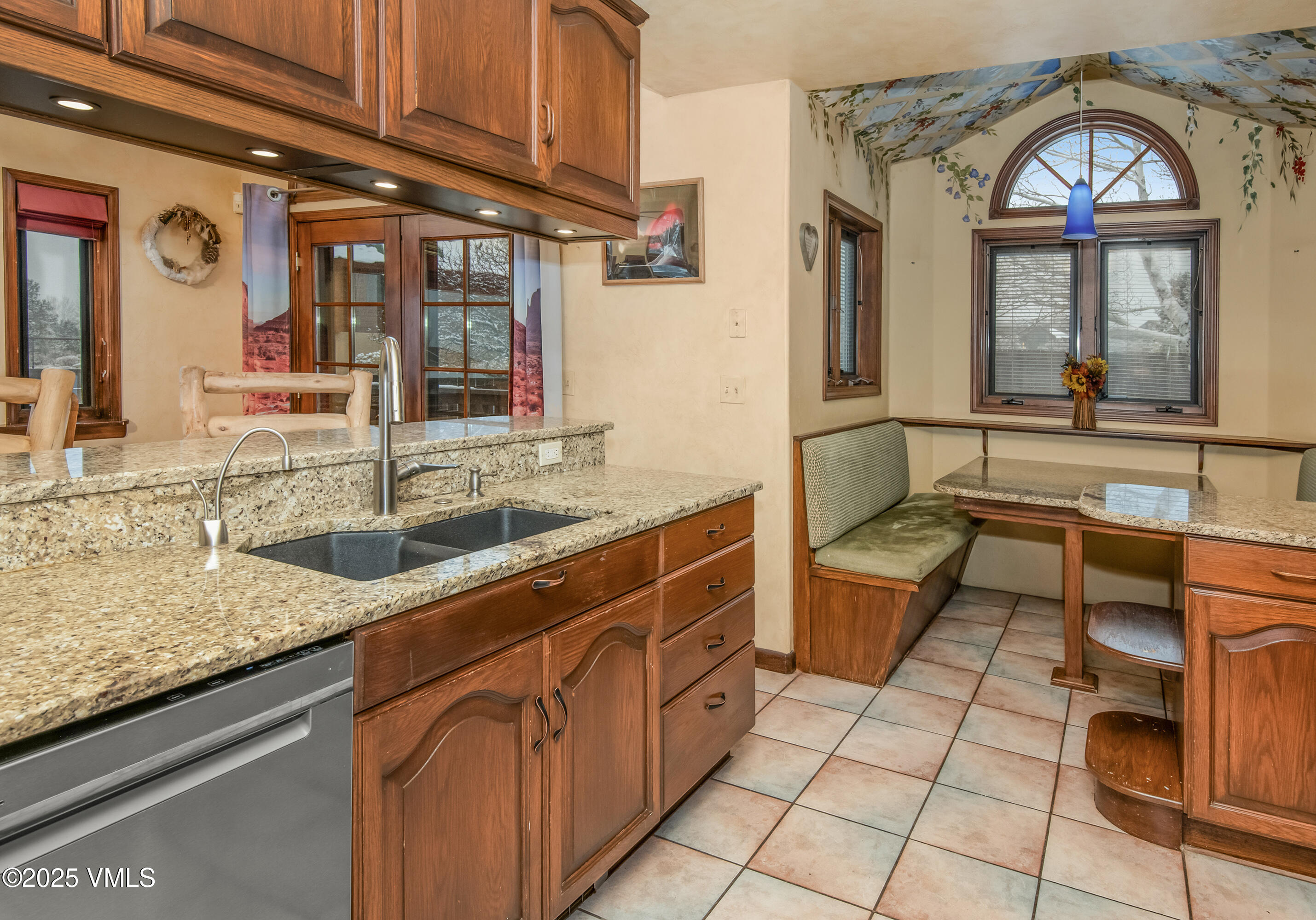 13 Pinion Lane Eagle, CO 81631 - Photo 13 of 60 a large kitchen with stainless steel appliances granite countertop a sink and cabinets