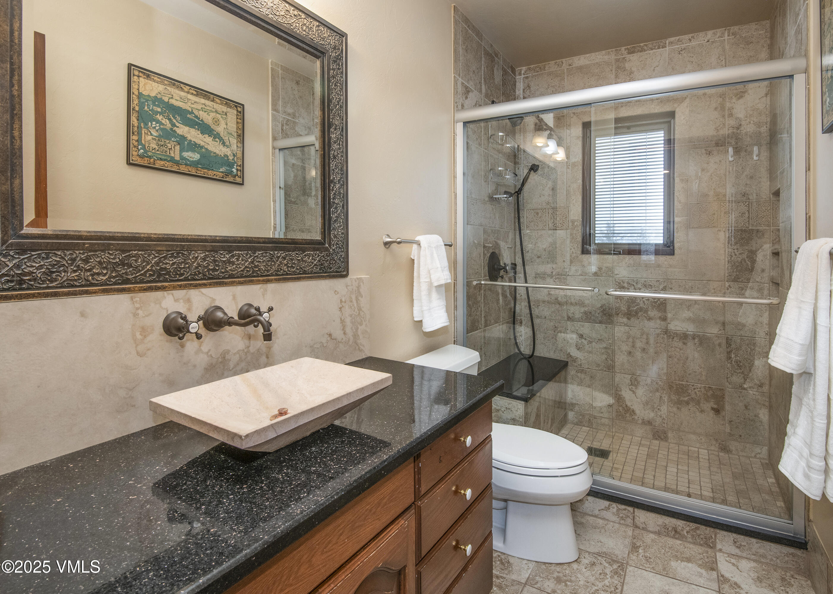 13 Pinion Lane Eagle, CO 81631 - Photo 15 of 60 a bathroom with a granite countertop sink mirror vanity and toilet