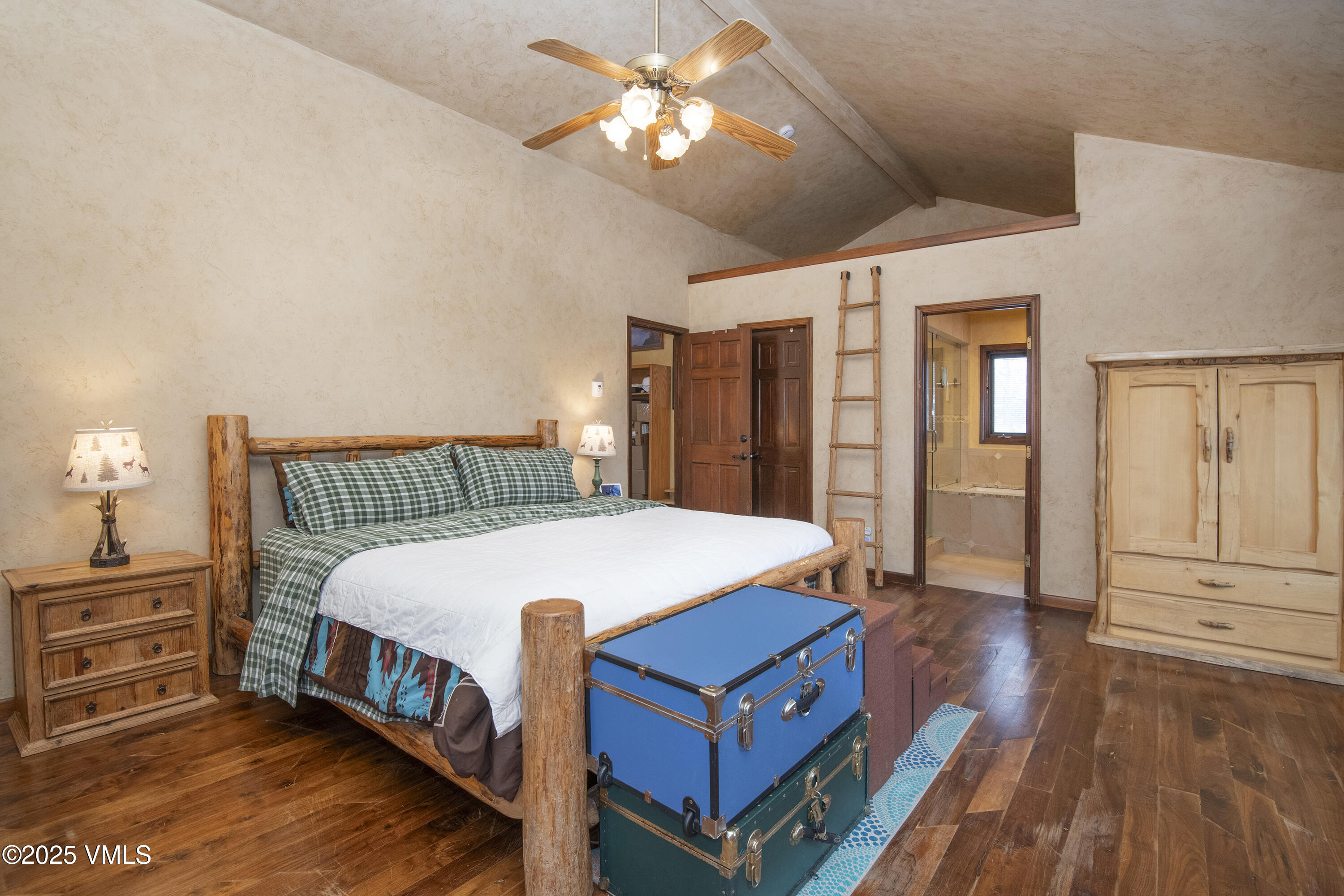 13 Pinion Lane Eagle, CO 81631 - Photo 17 of 60 a bed sitting in a bedroom next to a window