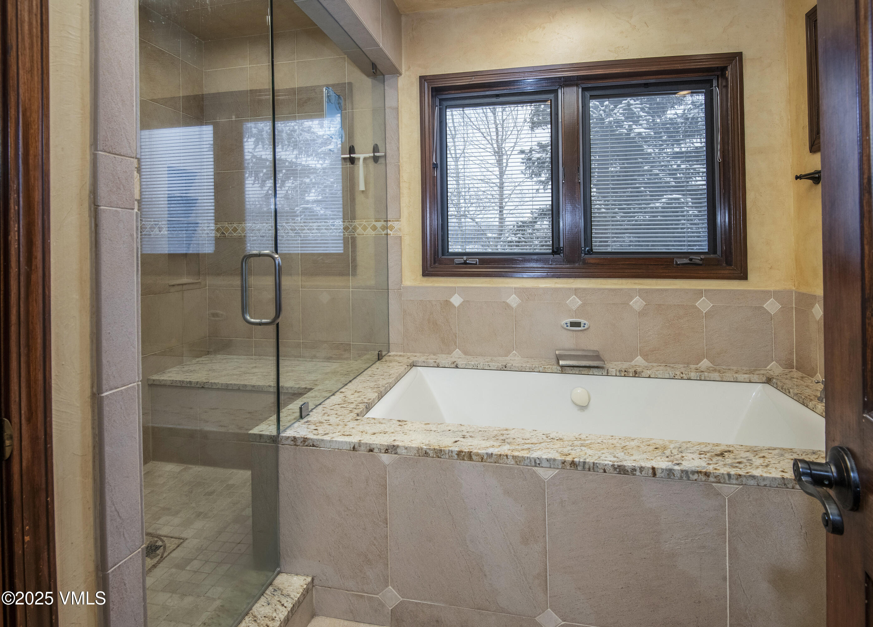 13 Pinion Lane Eagle, CO 81631 - Photo 18 of 60 a bathroom with a tub and shower