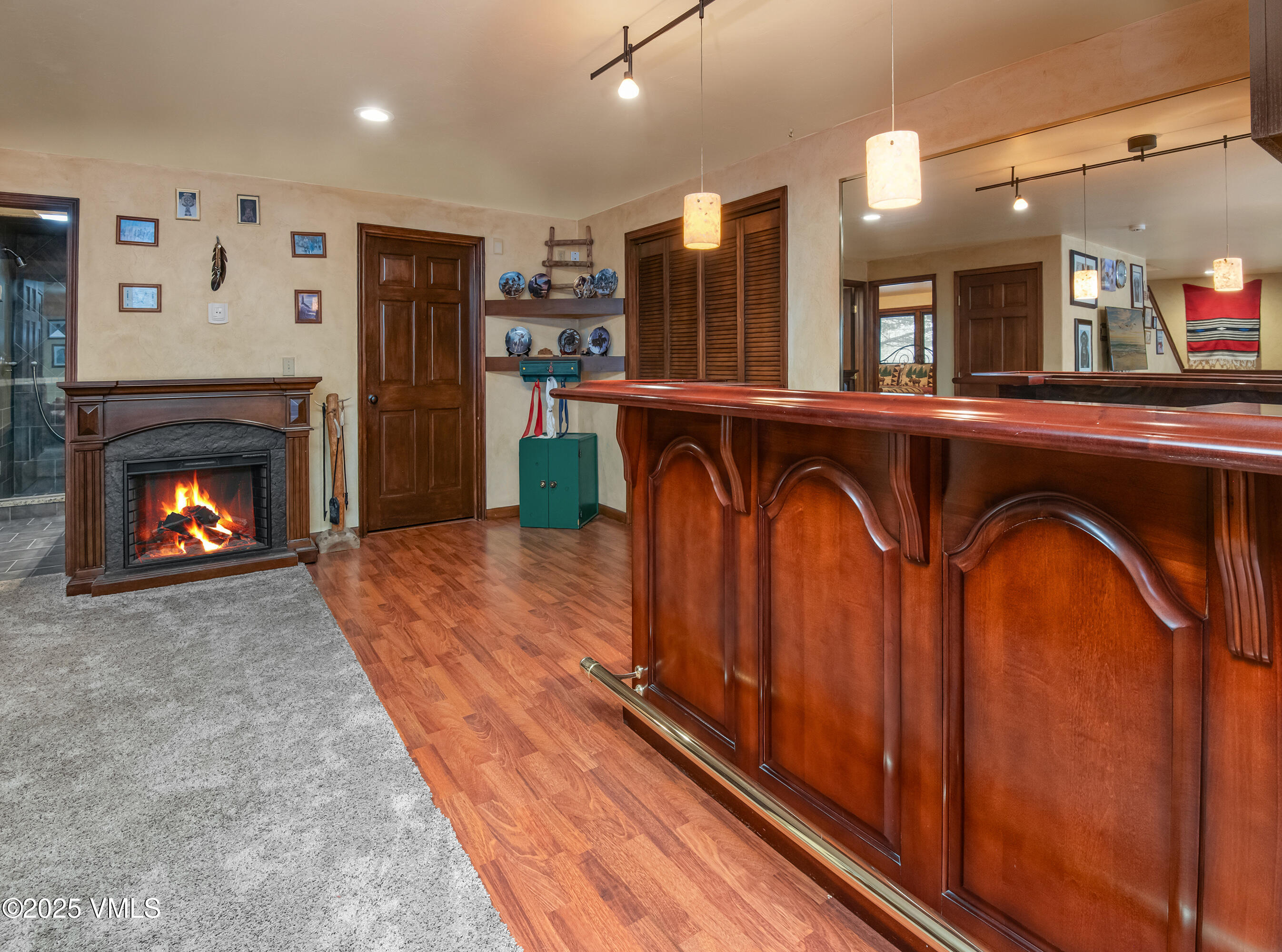 13 Pinion Lane Eagle, CO 81631 - Photo 24 of 60 a living room with stainless steel appliances furniture a fireplace and a kitchen view