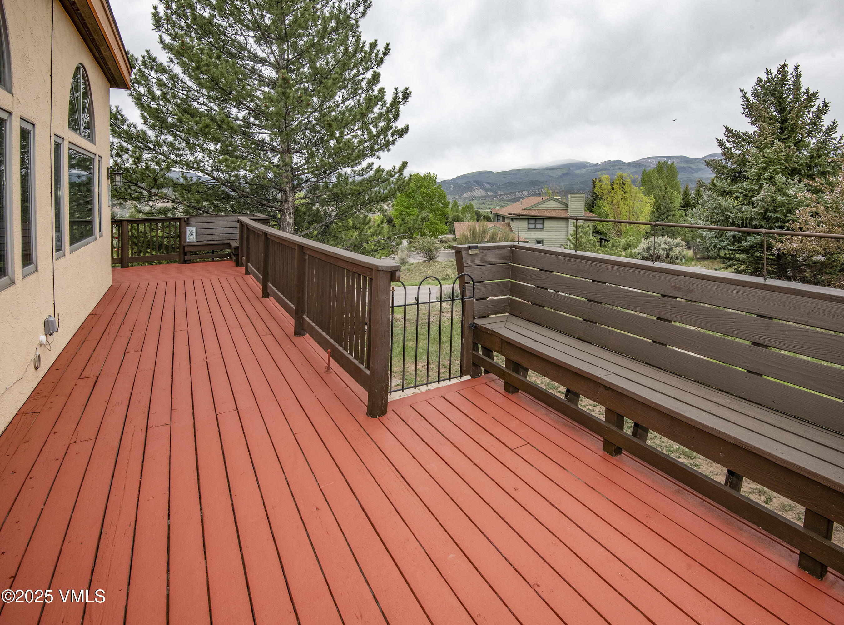 13 Pinion Lane Eagle, CO 81631 - Photo 27 of 60 a view of balcony with wooden floor and outdoor space