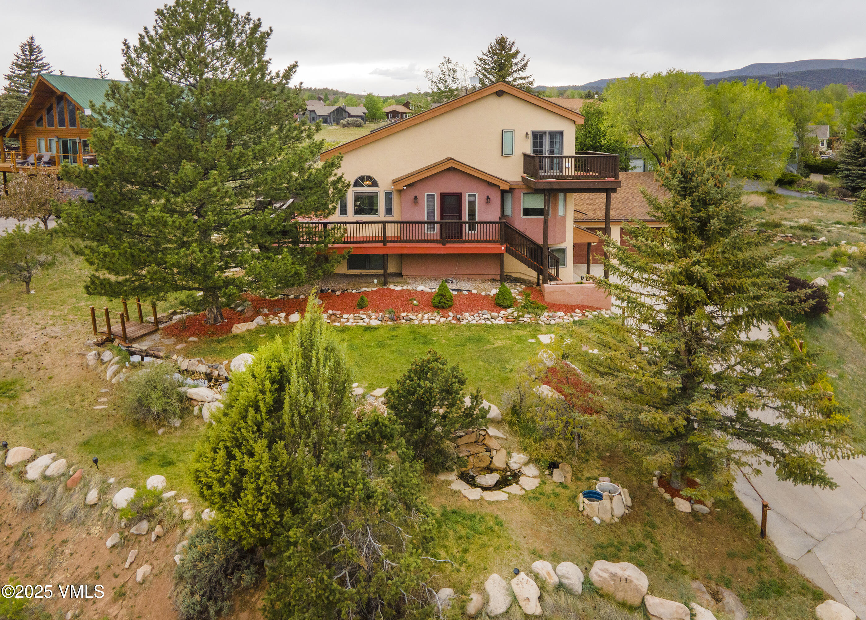 13 Pinion Lane Eagle, CO 81631 - Photo 41 of 60 a view of a house with a yard