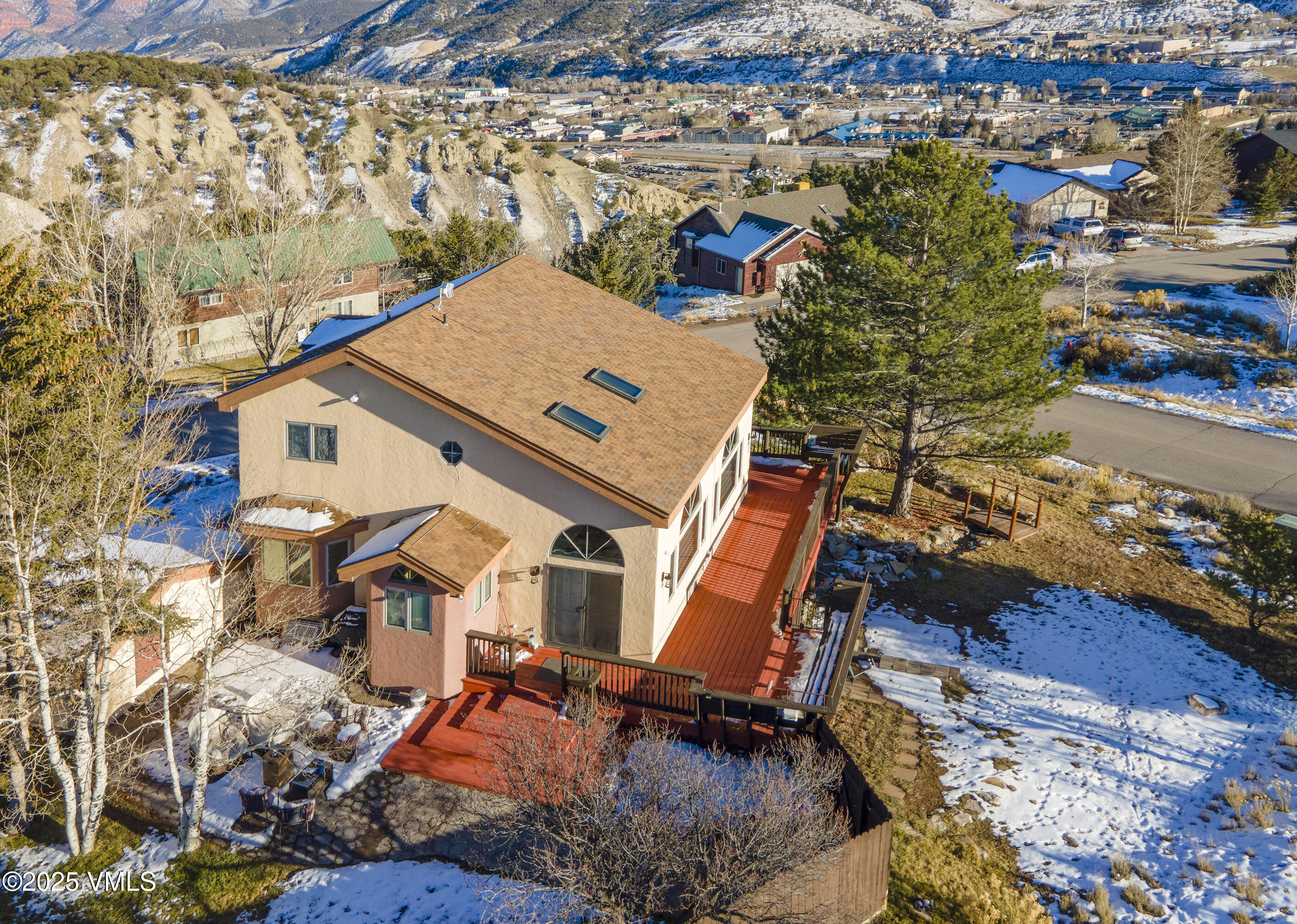 13 Pinion Lane Eagle, CO 81631 - Photo 55 of 60 an aerial view of a house with a yard and balcony