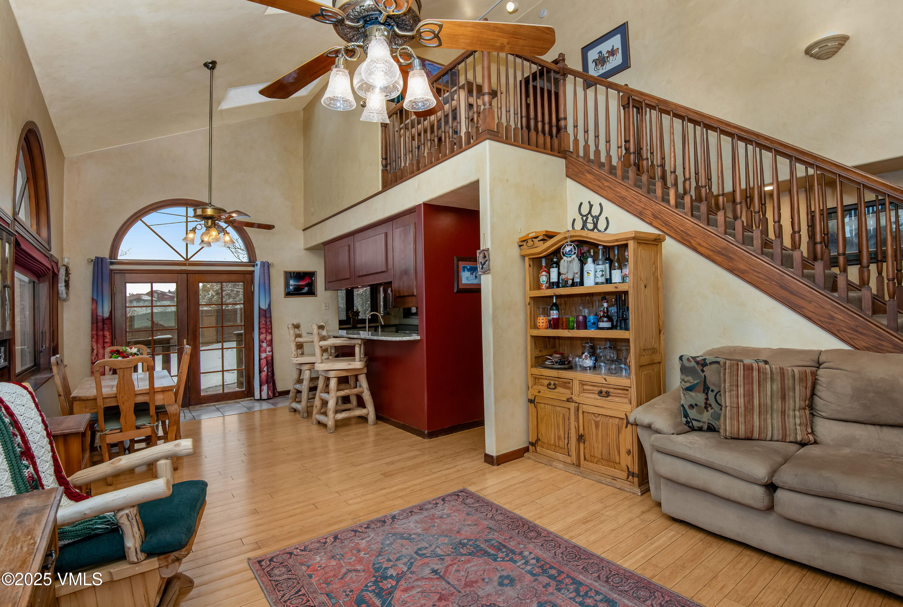 13 Pinion Lane Eagle, CO 81631 - Photo 6 of 60 a living room with furniture or chandelier and a wooden floor