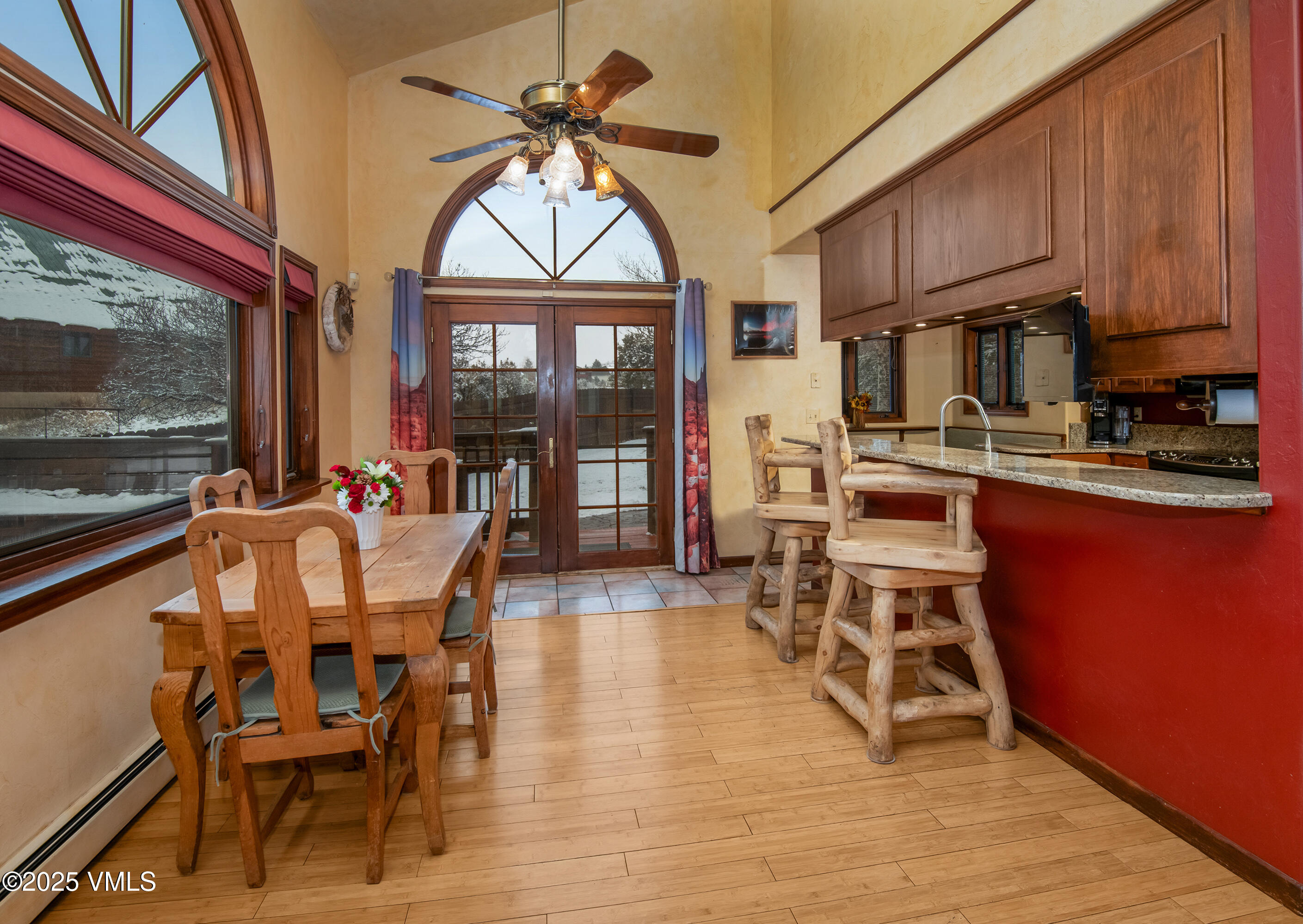 13 Pinion Lane Eagle, CO 81631 - Photo 7 of 60 a view of a dining room with furniture window and wooden floor