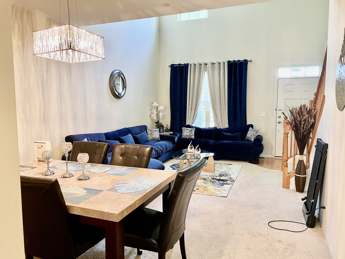 2018 Shermer Road, Unit 2018 Glenview, IL 60026 - Photo 5 of 39 a kitchen with a table chairs and a chandelier