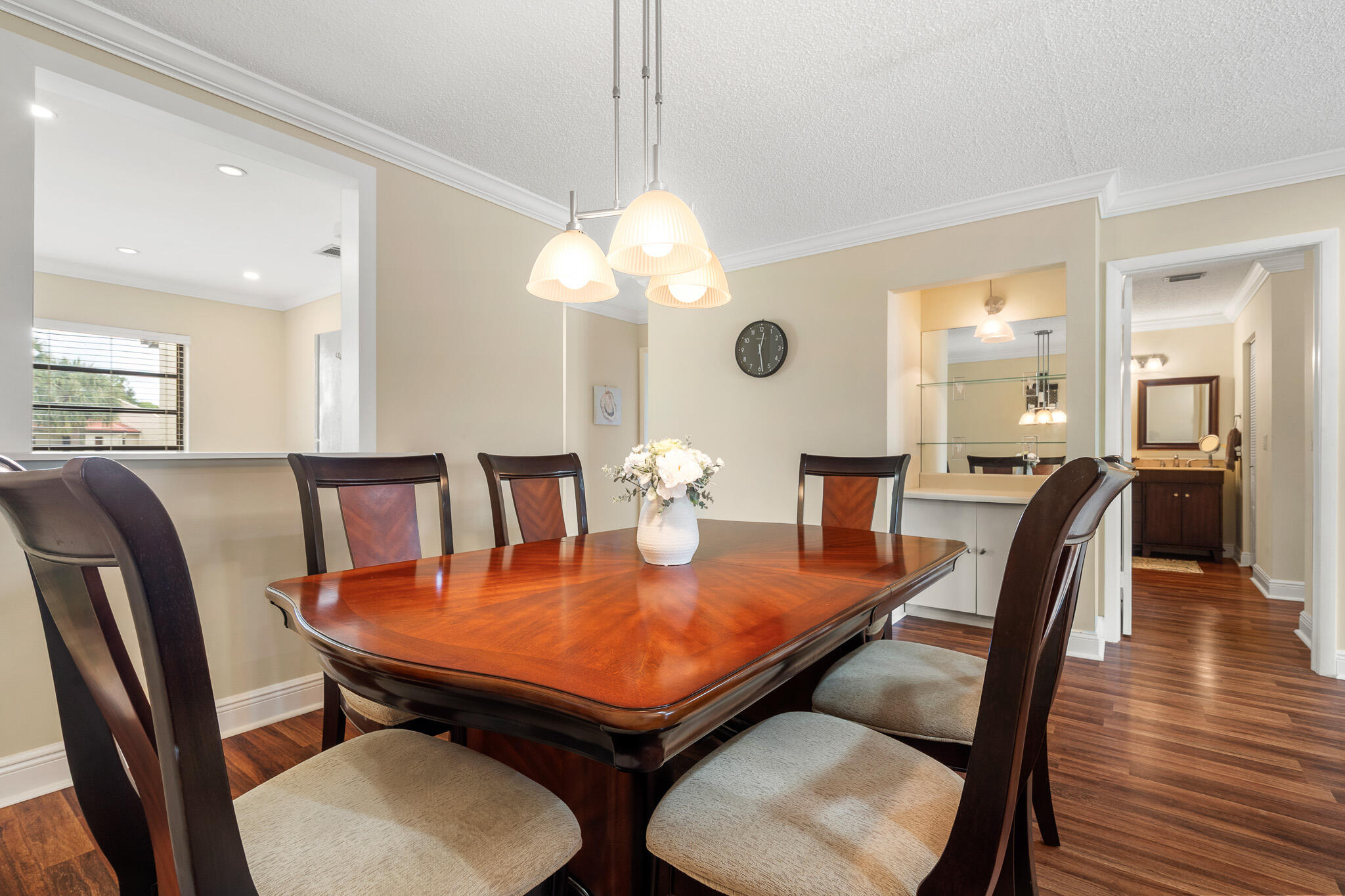 21218 Lago Circle, Unit H Boca Raton, FL 33433 - Photo 15 of 43 a dining room with furniture and wooden floor