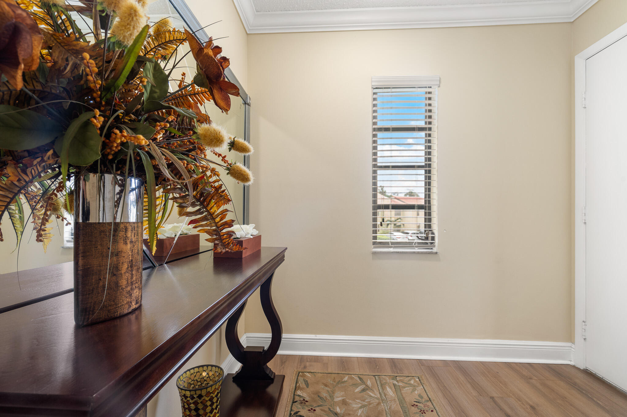 21218 Lago Circle, Unit H Boca Raton, FL 33433 - Photo 9 of 43 a view of entryway with wooden floor