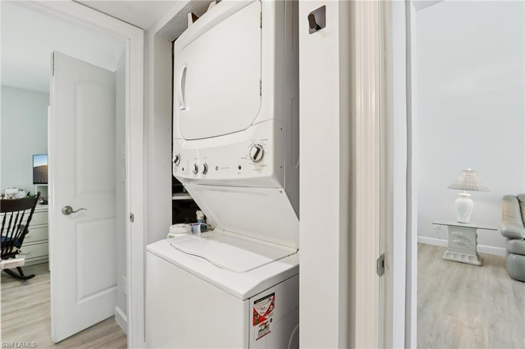 2185 San Marco Road, Unit 3103 Marco Island, FL 34145 - Photo 11 of 22 a utility room with dryer and washer