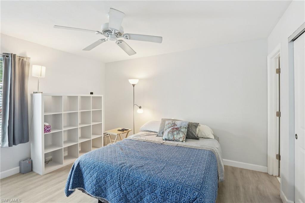 2185 San Marco Road, Unit 3103 Marco Island, FL 34145 - Photo 12 of 22 a bedroom with a bed and a window