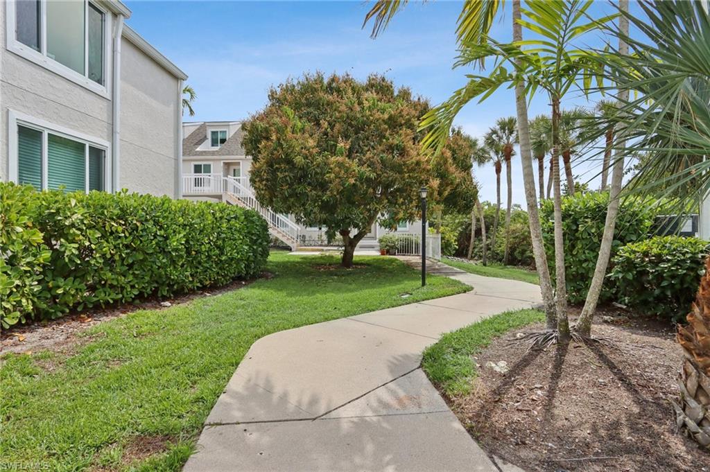 2185 San Marco Road, Unit 3103 Marco Island, FL 34145 - Photo 19 of 22 a view of a park with a fountain