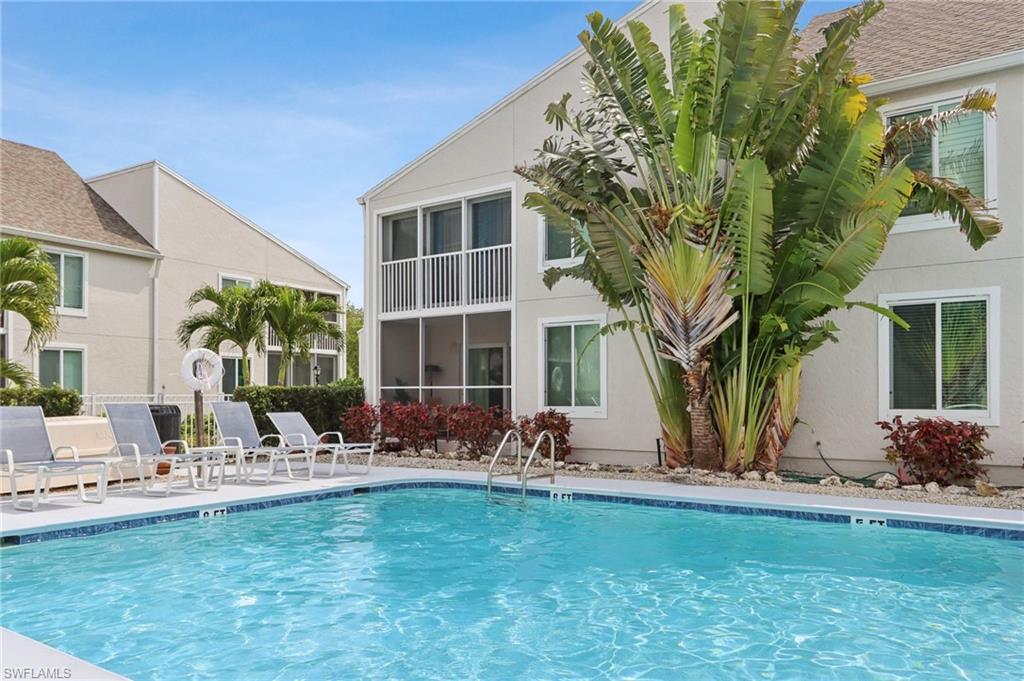 2185 San Marco Road, Unit 3103 Marco Island, FL 34145 - Photo 20 of 22 a front view of a house with garden