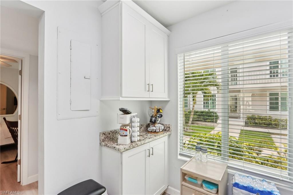2185 San Marco Road, Unit 3103 Marco Island, FL 34145 - Photo 7 of 22 a kitchen with a sink and cabinets