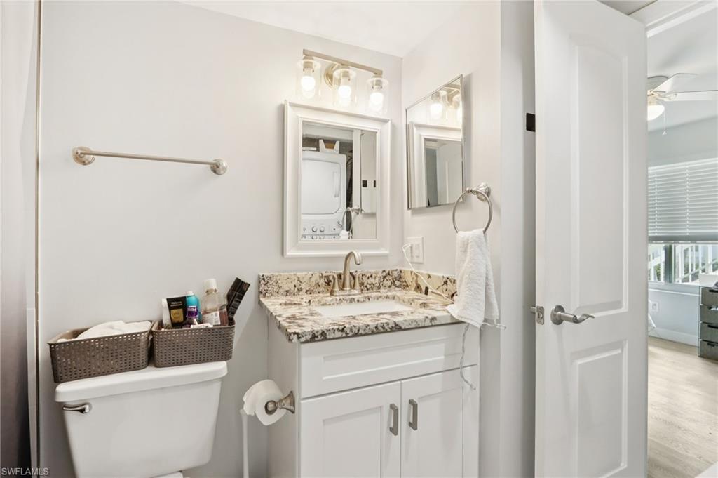 2185 San Marco Road, Unit 3103 Marco Island, FL 34145 - Photo 10 of 22 a bathroom with a sink a toilet and shower