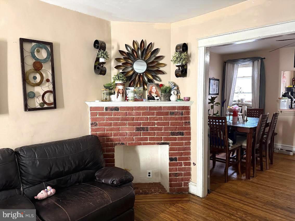 75 Lamport Road Upper Darby, PA 19082 - Photo 8 of 17 Charming living space with rustic warmth.
