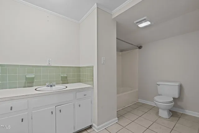 a view of cabinets and wooden floor