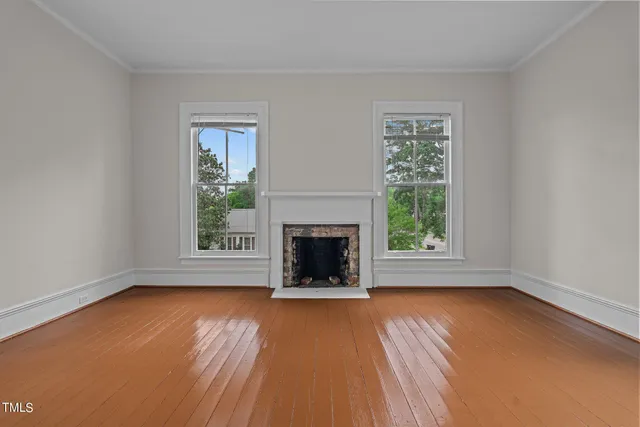 a bathroom with a sink toilet vanity and tub