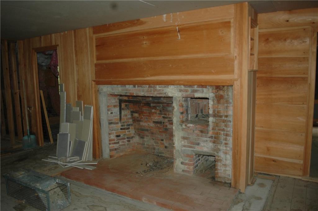 6-10 Cabbage Yard Road Standish, ME 04084 - Photo 5 of 27 This fireplace is in the large...